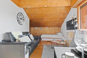 Uma TV ou centro de entretenimento em Superbe studio avec une vue magnifique