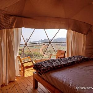 Postel nebo postele na pokoji v ubytování Pent house Glamp