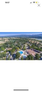 an aerial view of a park with a lake at Domaine des Iscles mobile home clim, jardinet sans vis-à-vis in La Roque-dʼAnthéron +29 photos