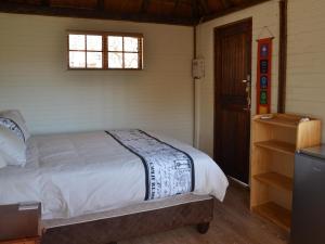 Voodi või voodid majutusasutuse Simunye Private Game Reserve toas