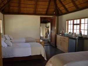 Voodi või voodid majutusasutuse Simunye Private Game Reserve toas