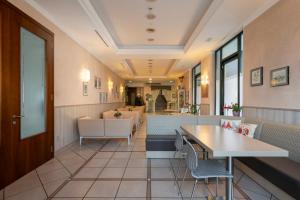 Гостиная зона в Hotel Mondial