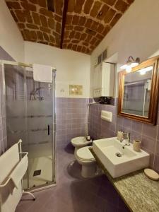 Kúpeľňa v ubytovaní Le Serre Suites & Apartments