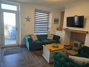 Et opholdsområde på Eden Rose Cottage hot-tub jacuzzi morecambe-bay