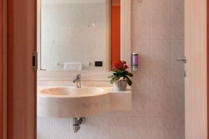Ванная комната в Hotel Mondial