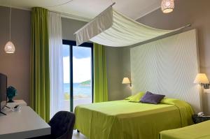 Postel nebo postele na pokoji v ubytování Hotel Gargano + 37 fotografií