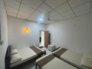 Posezení v ubytování GB Royal Stay Anuradhapura