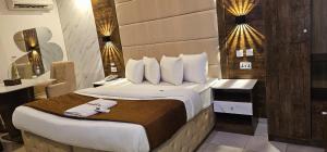 Katil atau katil-katil dalam bilik di Presken Hotels Ikoyi