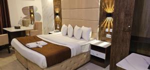 Katil atau katil-katil dalam bilik di Presken Hotels Ikoyi