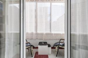 Posezení v ubytování Downtown City Apartment