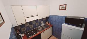 Kuchyň nebo kuchyňský kout v ubytování B&B JOY