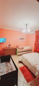 Postel nebo postele na pokoji v ubytování B&B JOY