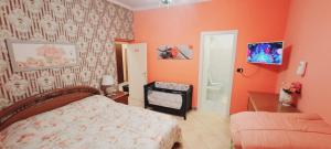 Postel nebo postele na pokoji v ubytování B&B JOY