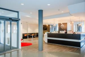 TV a/nebo společenská místnost v ubytování Hotel Corsendonk Viane