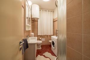 Koupelna v ubytování Downtown City Apartment