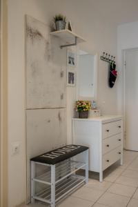 Kuchyň nebo kuchyňský kout v ubytování Downtown City Apartment