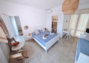 Postel nebo postele na pokoji v ubytování Casa del mare