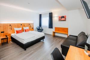 Postel nebo postele na pokoji v ubytování Hotel Corsendonk Viane