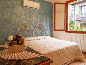 Posteľ alebo postele v izbe v ubytovaní Appartamenti Portobello