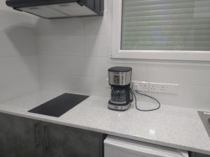 Kuchyň nebo kuchyňský kout v ubytování Ermioni Apartments