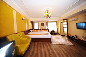 Voodi või voodid majutusasutuse Tibet Boutique Hotel toas