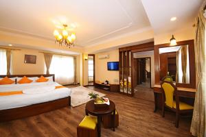 Voodi või voodid majutusasutuse Tibet Boutique Hotel toas