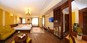 Voodi või voodid majutusasutuse Tibet Boutique Hotel toas