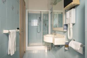 Ванная комната в Hotel Mondial