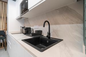 Una cocina o zona de cocina en VLC HOST - Palleter