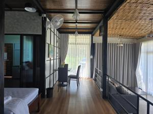 Posezení v ubytování Sattee's Home บ้านพักเศรษฐี