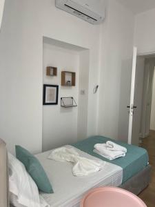 Postel nebo postele na pokoji v ubytování Cozy Apartment near Center