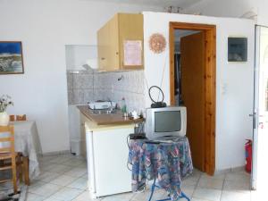 Η κουζίνα ή μικρή κουζίνα στο Taygetos Apartments