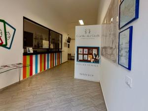 Cortile dei Giusti - Combo Guesthouse的厨房或小厨房