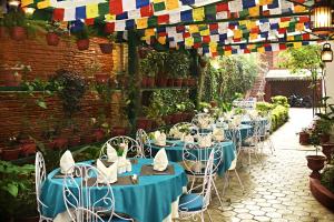 Restoran või mõni muu söögikoht majutusasutuses Tibet Boutique Hotel
