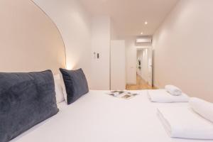 Postel nebo postele na pokoji v ubytování ISG Apartments Triana 1
