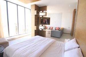 Postel nebo postele na pokoji v ubytování Maison d'Appartements Vue Mer - Luxe Tangeroi & Confort Européen