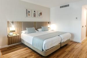 Postel nebo postele na pokoji v ubytování Hotel Las Costas
