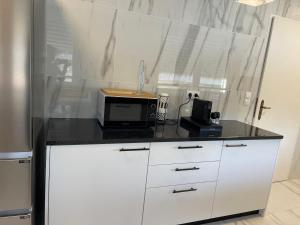 Köök või kööginurk majutusasutuses 暖暖屋