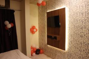 TV a/nebo společenská místnost v ubytování Hotel Anuha