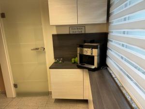 Kuchyň nebo kuchyňský kout v ubytování Kaja 2 mit eigener Sauna + 28 fotografií
