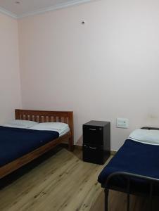 Letto o letti in una camera di MM comforts