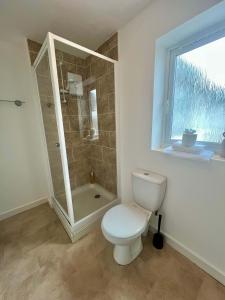 Koupelna v ubytování Halliday House + 11 fotografií