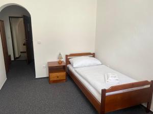 Rúm í herbergi á Nobiles hotel Šternberk