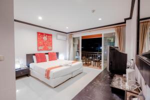 Postel nebo postele na pokoji v ubytování Napalai Resort Hua Hin