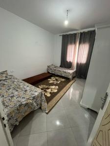 Postel nebo postele na pokoji v ubytování Maison Essid kelibia + 5 fotografií