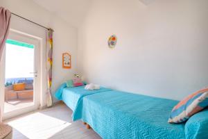 Ένα ή περισσότερα κρεβάτια σε δωμάτιο στο Holiday K1