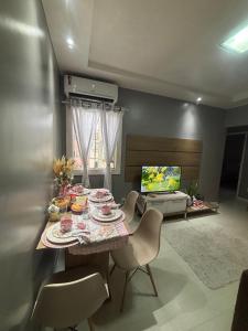 Posezení v ubytování Apto dois quartos Px de tudo ideal pra cop + 15 fotografií