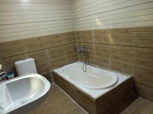 A bathroom at Hotel Dev Inn