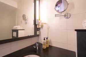 Koupelna v ubytování Hotel Madeleine Biohotel + 37 fotografií