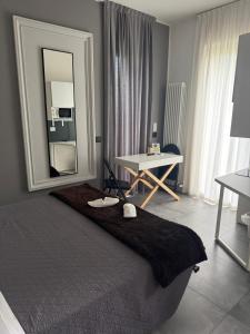 Postel nebo postele na pokoji v ubytování B&B Relax Rooms - Villa Murari Brà